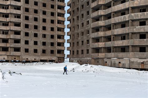  Concrete Jungle: Exploring Urban Architecture in Post-Soviet Russia -  A Poetic Ode To Decay and Resilience Amidst Crumbling Concrete